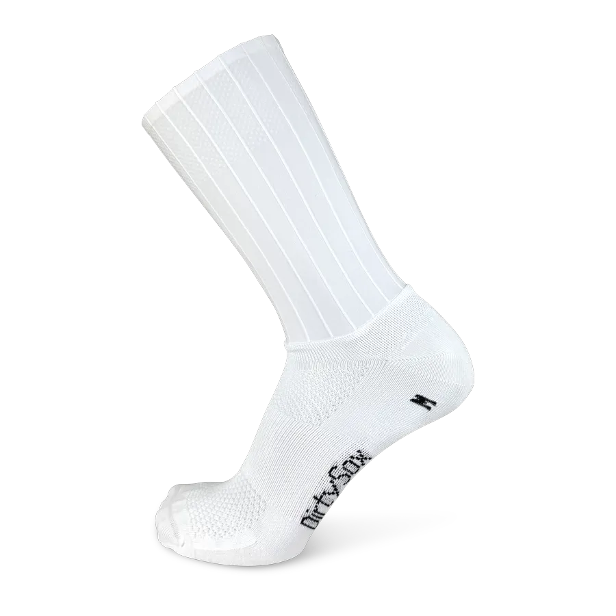 A white sports sock stands upright, slightly tilted left. It has a high ribbed cuff, and the foot area has a fine, breathable mesh knit. ‘DirtySox ’ is printed in black on the arch, and the heel is marked with an ‘M’.